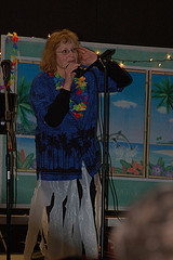 Bev getting the Saturday night ceilidh going! Love the "grass" skirt, don't you?
