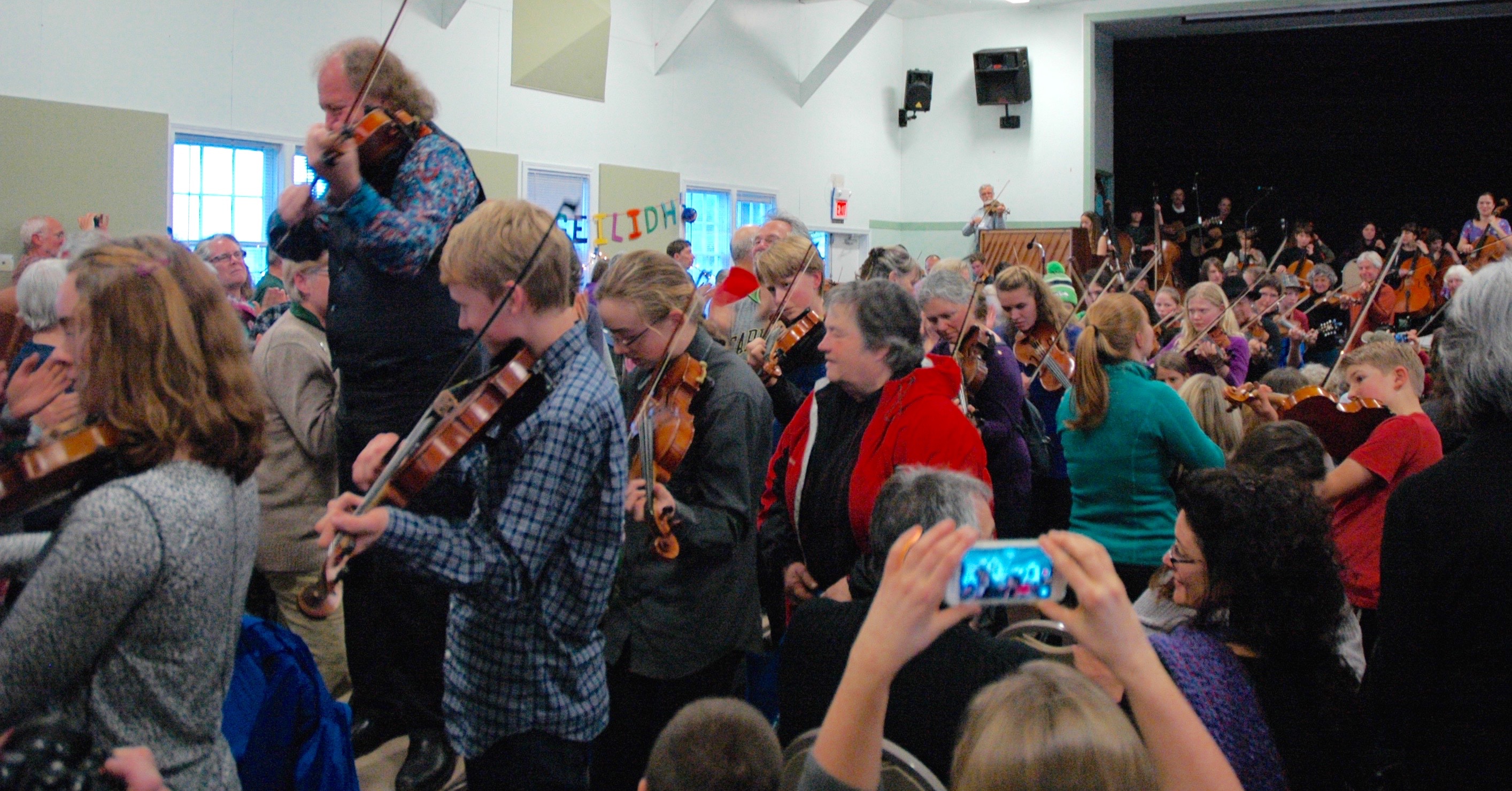 Grand finale - 2016 concert. Musicians mix with the crowd.
